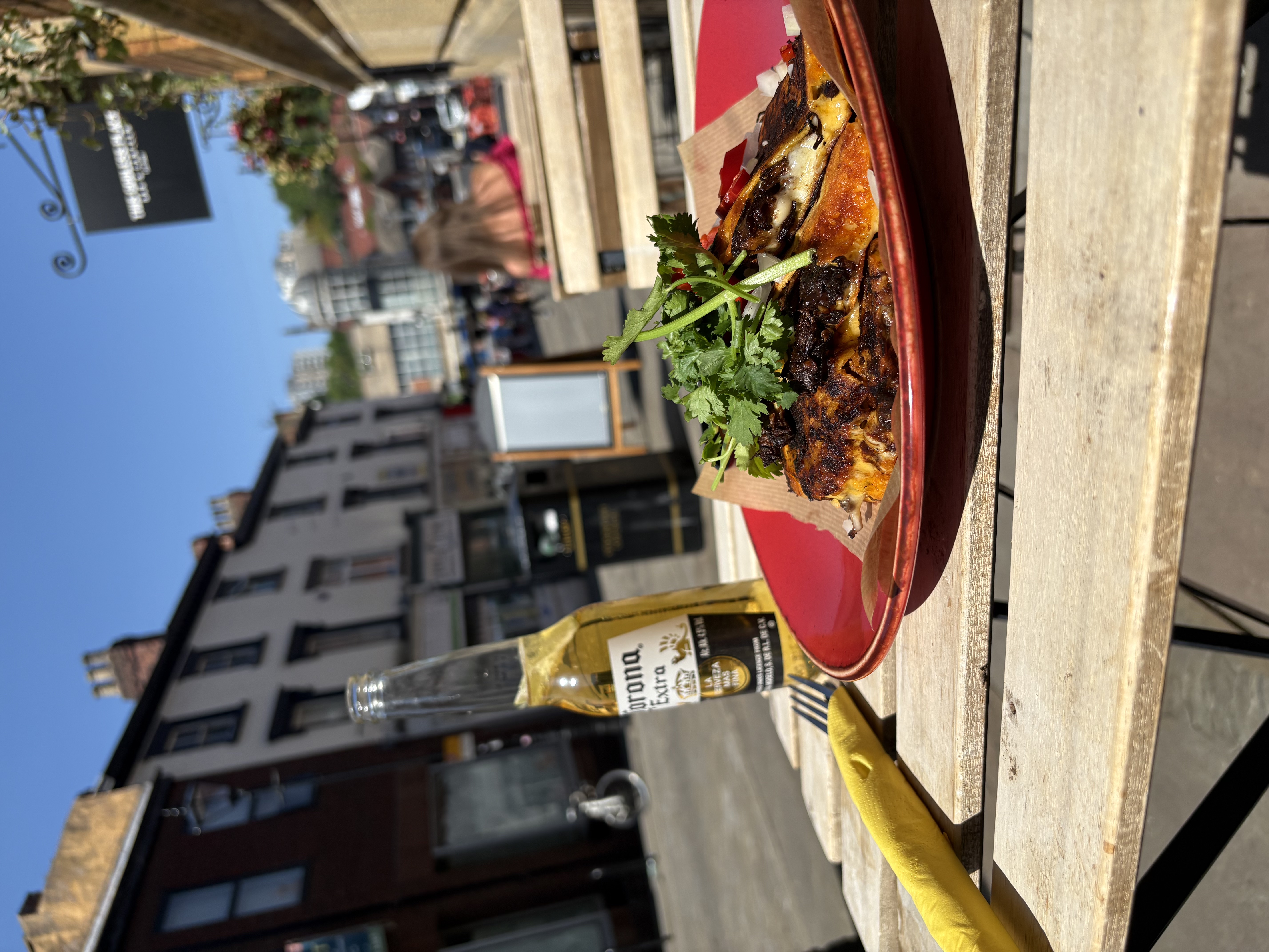 Lunch outside in Stockport sunshine - food and a Corona on a sunny street